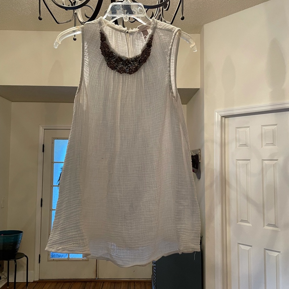 Cream, sequined neck top. Size M